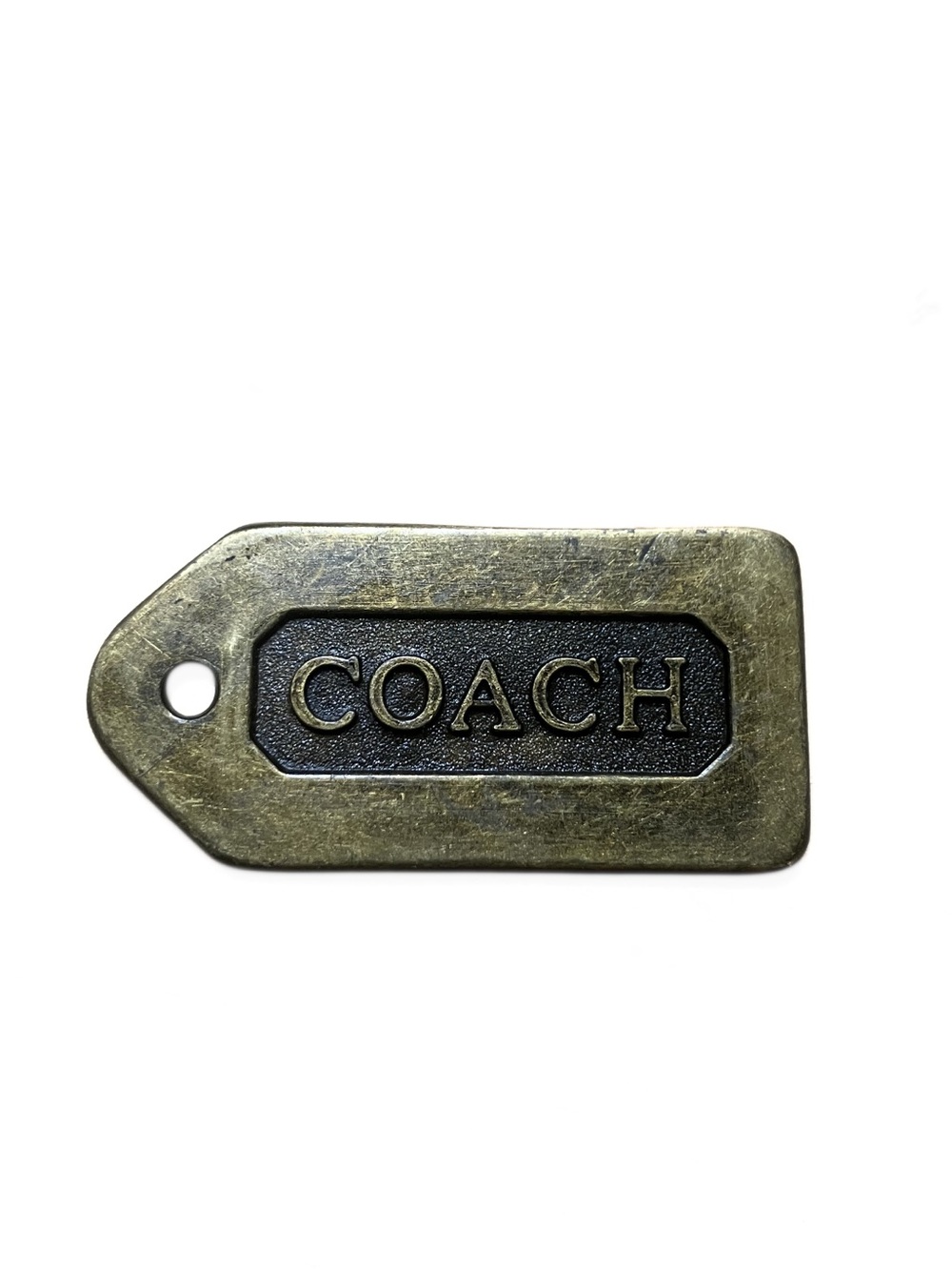 Coach vintage brass Hangtag.